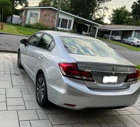 $1,500 – Honda Civic EX • Sedan