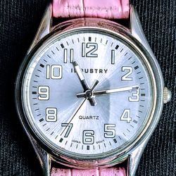 ladies women's industry watch with a pink band and a new battery $5