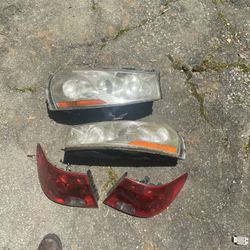 Headlights and tail lights  05 Saturn L300