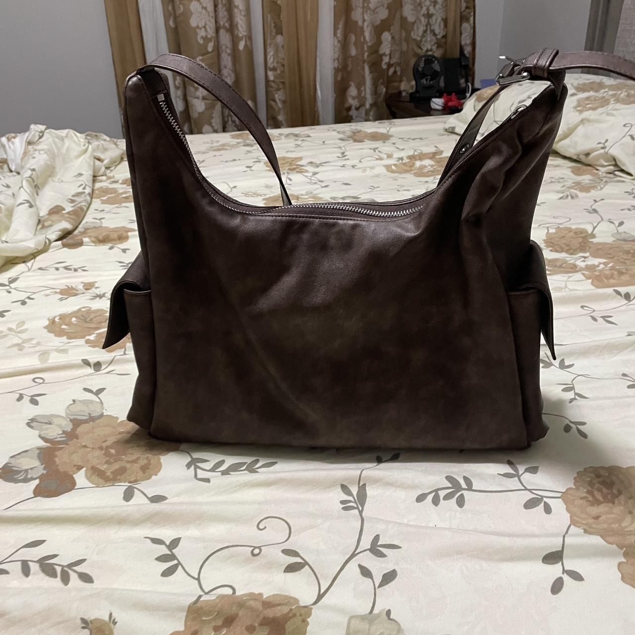 Samo ondoh brown pocket bag in size medium.(127)61