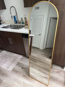 Gold floor mirror
