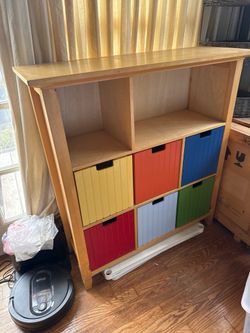 Free wooden cabinet with colorful wood cubby drawers