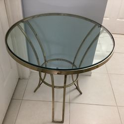 table/ round glass top / 2 available/ $100. ea