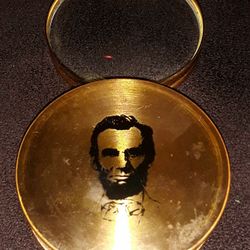 RARE ABRAHAM LINCOLN BRASS PAPERWEIGHT / MAGNIFYING GLASS

