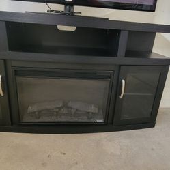 Samsung TV 50" , And TV Fire Place Stand 60"