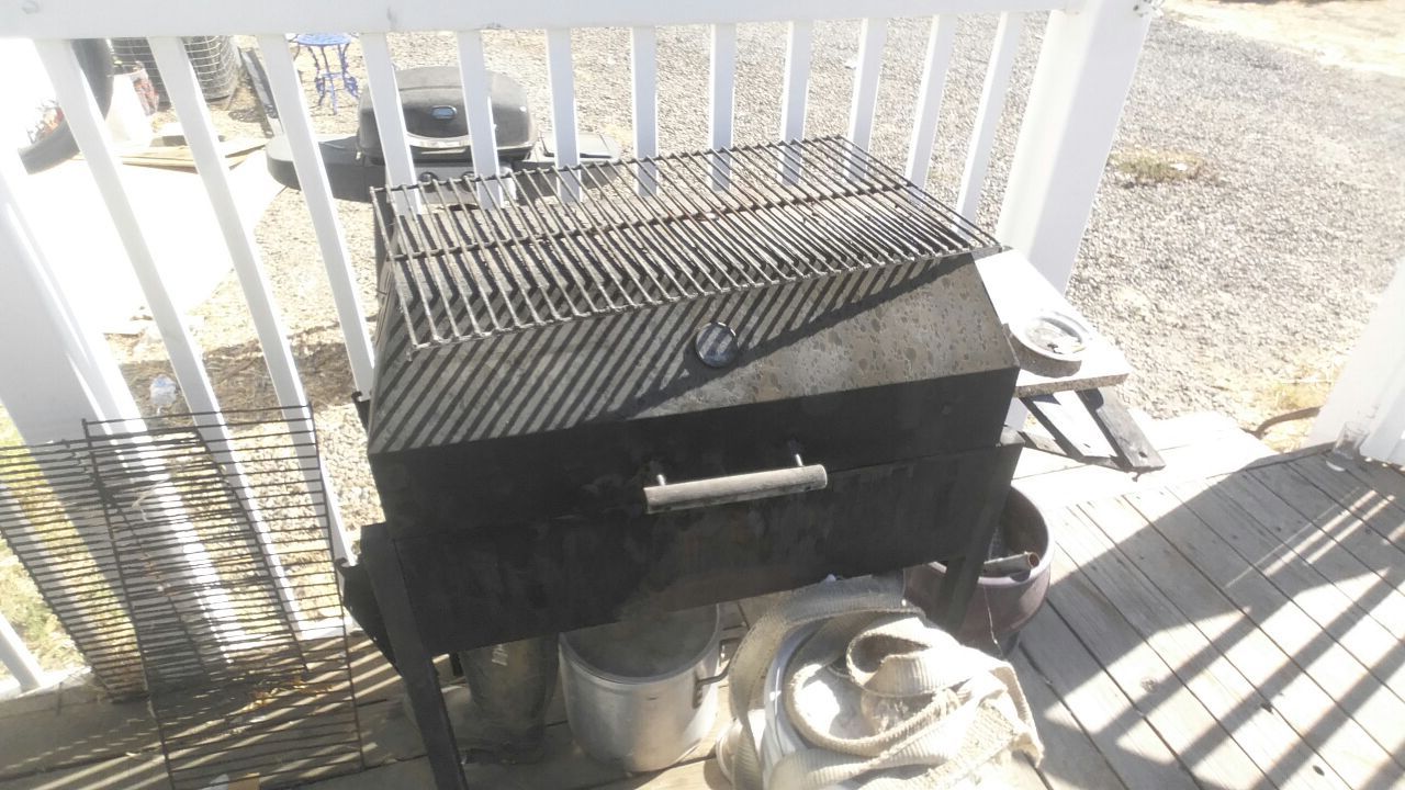 Charcoal bbq also works as a smoker