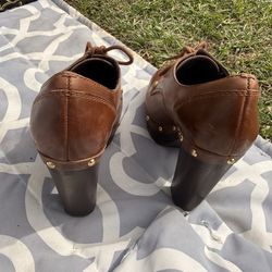 Vince Camuto, leather and wood lace up clogged shoes, size 7