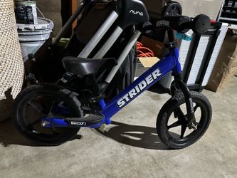 Toddler Bike - Strider (ride on 2 wheels easily)