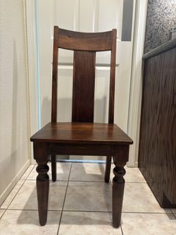 Four Solid Wood Chairs