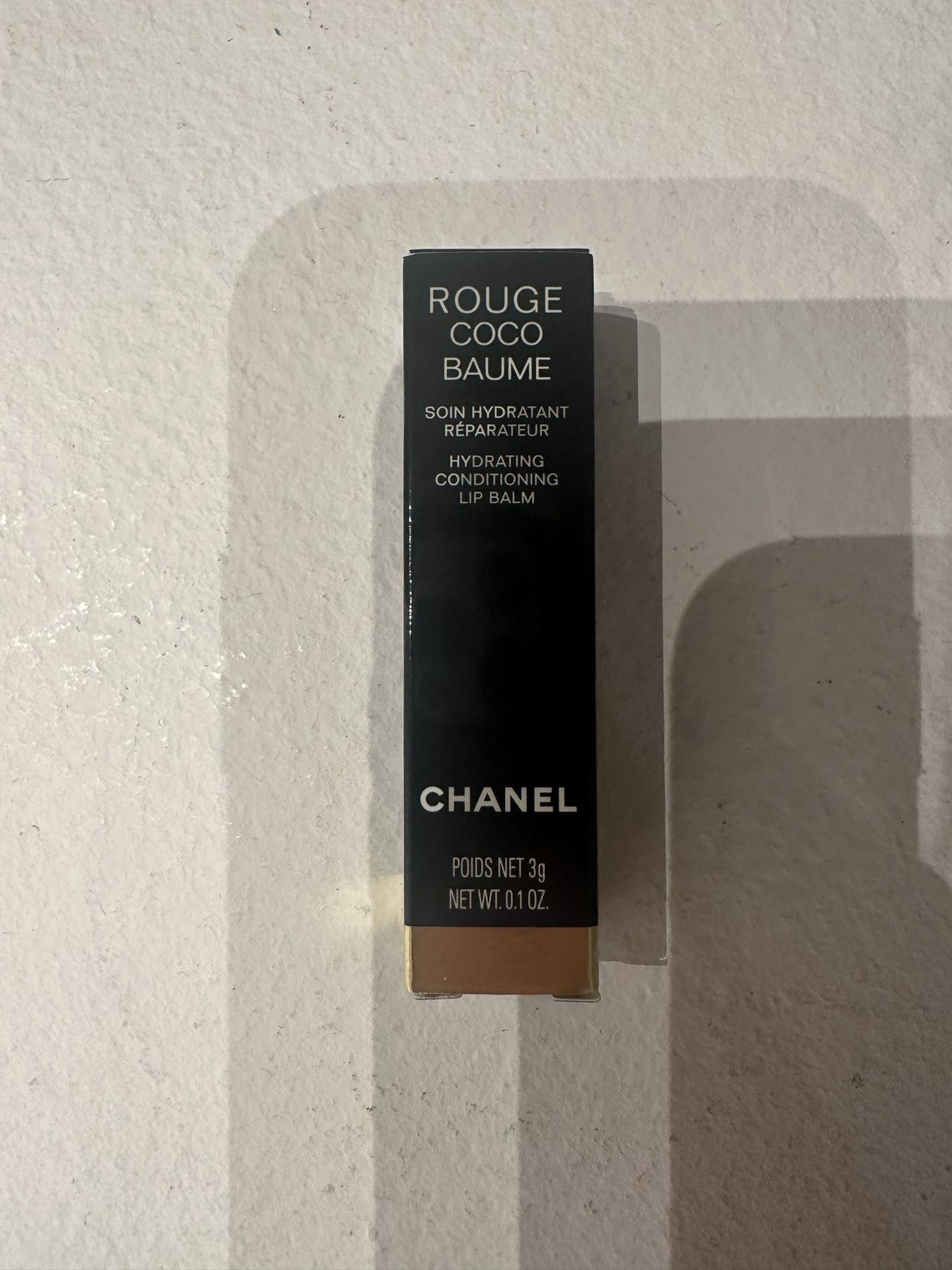 Chanel Rouge Coco Baume Clear Lipstick “Dreamy White”