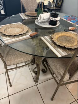 Glass table with 4 chairs
