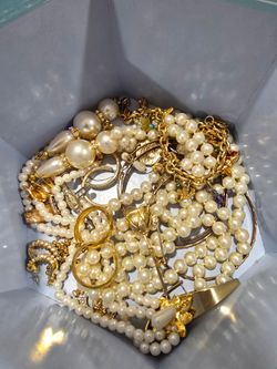 Assorted box with jewelry and more