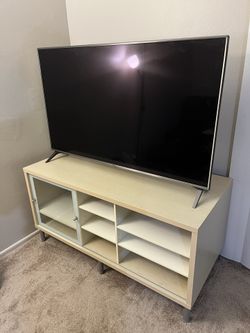 TV Stand + LG 55in Smart TV