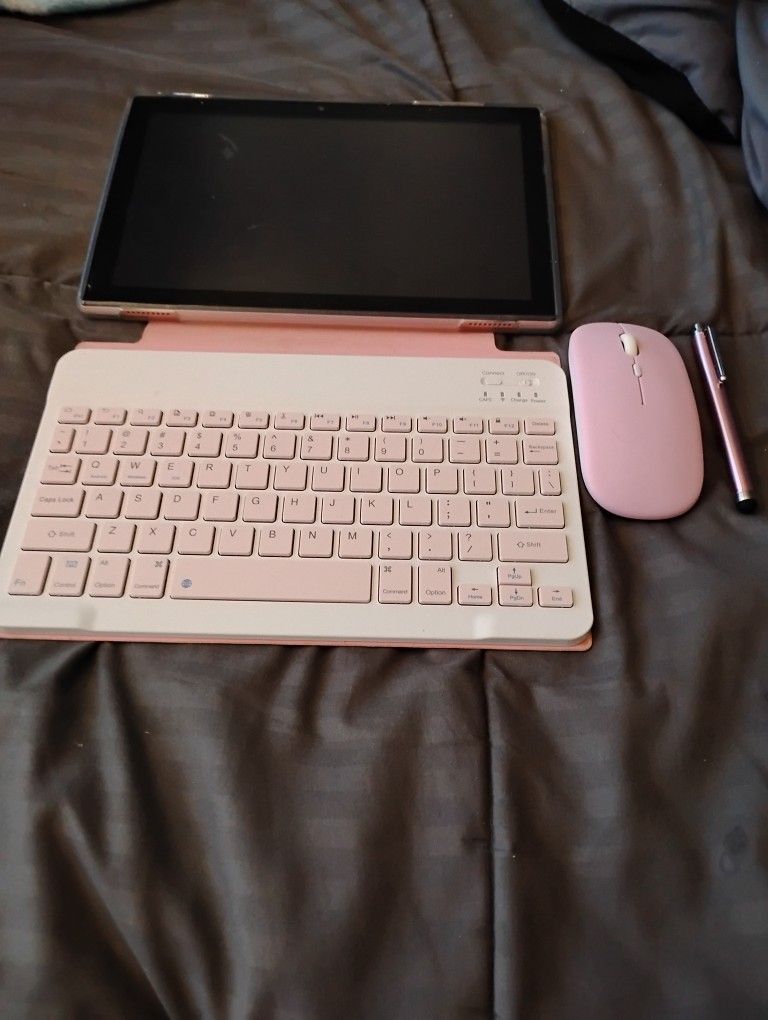 Pink Tablet With Keyboard And Mouse And A Stylus Pen