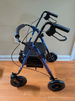 Walker with large all terrain rubber tires
