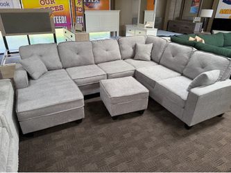 Light gray sectional w/ ottoman
