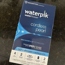 BRAND NEW WATERPIK CORDLESS WATER FLOSSER