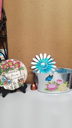 Garden set- stone, flower pot and a wind chime