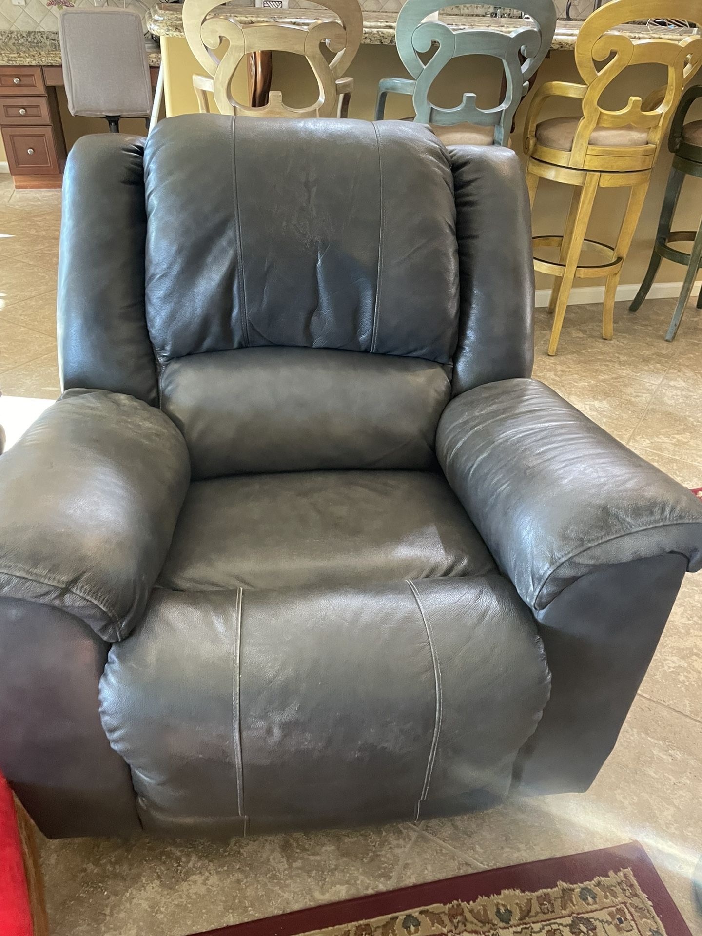 2 Leather Reclining Chairs