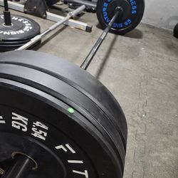 Olympic Barbell And Bumper Plate Set