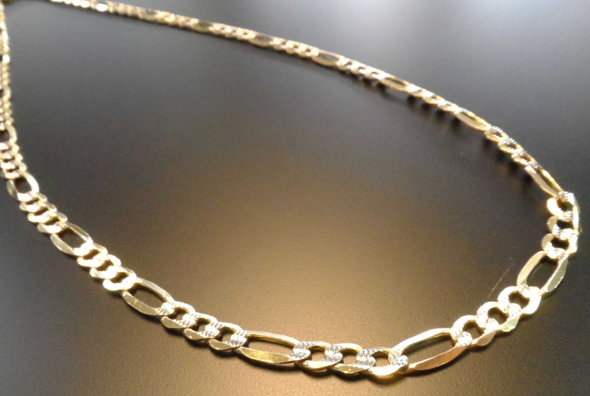 10K GOLD 24IN FIGARO LINK CHAIN (31GR)