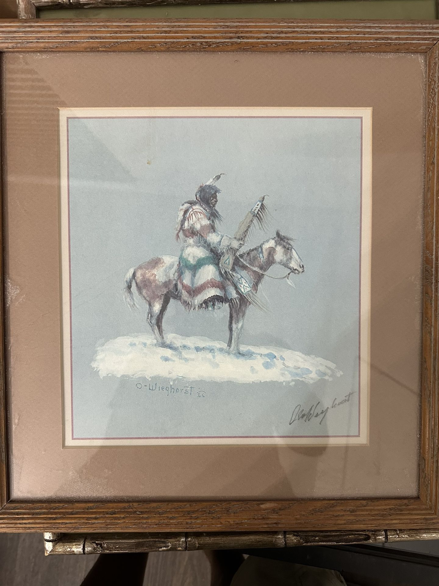 This image is a lithograph print titled "Slow Rider in Snow" by Danish-American Western artist Olaf Wieghorst (1(contact info removed)).