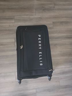 Large perry ellis suit case.