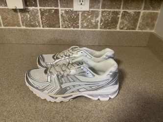 All White ASICS 