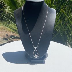 Sterling silver necklace with a heart butterfly charm
