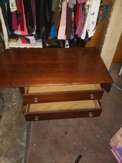 Drop leaf coffee table with drawers