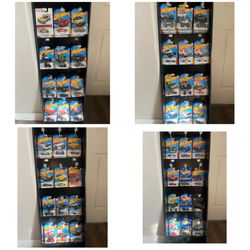 48 new hot wheels never open  with non hot wheels display . perfect for x más gifts 