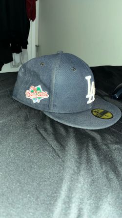 7 1/4 New Era Los Angeles Dodgers 59FIFTY fitted hat in navy blue with a side patch.