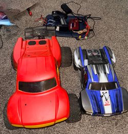 2 Traxxas RC Cars, 1-Charger, 2/Batteries (4blue car)