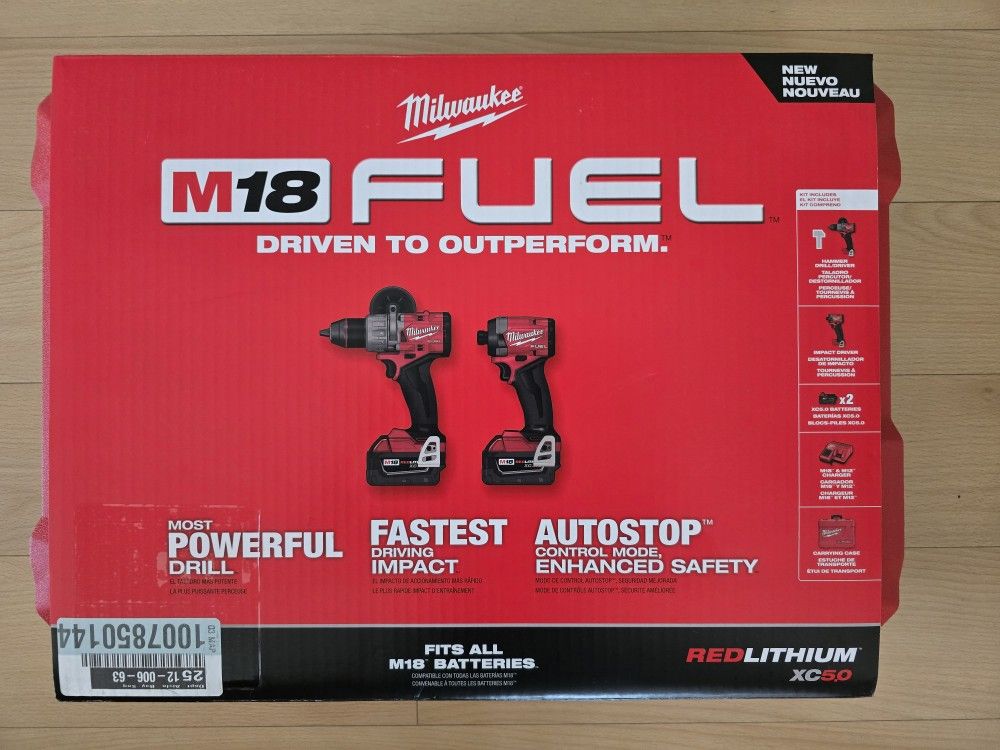 Milwaukee M18 Fuel Hammer Drill and Impact Driver 2x 5.0ah Battery And Charger