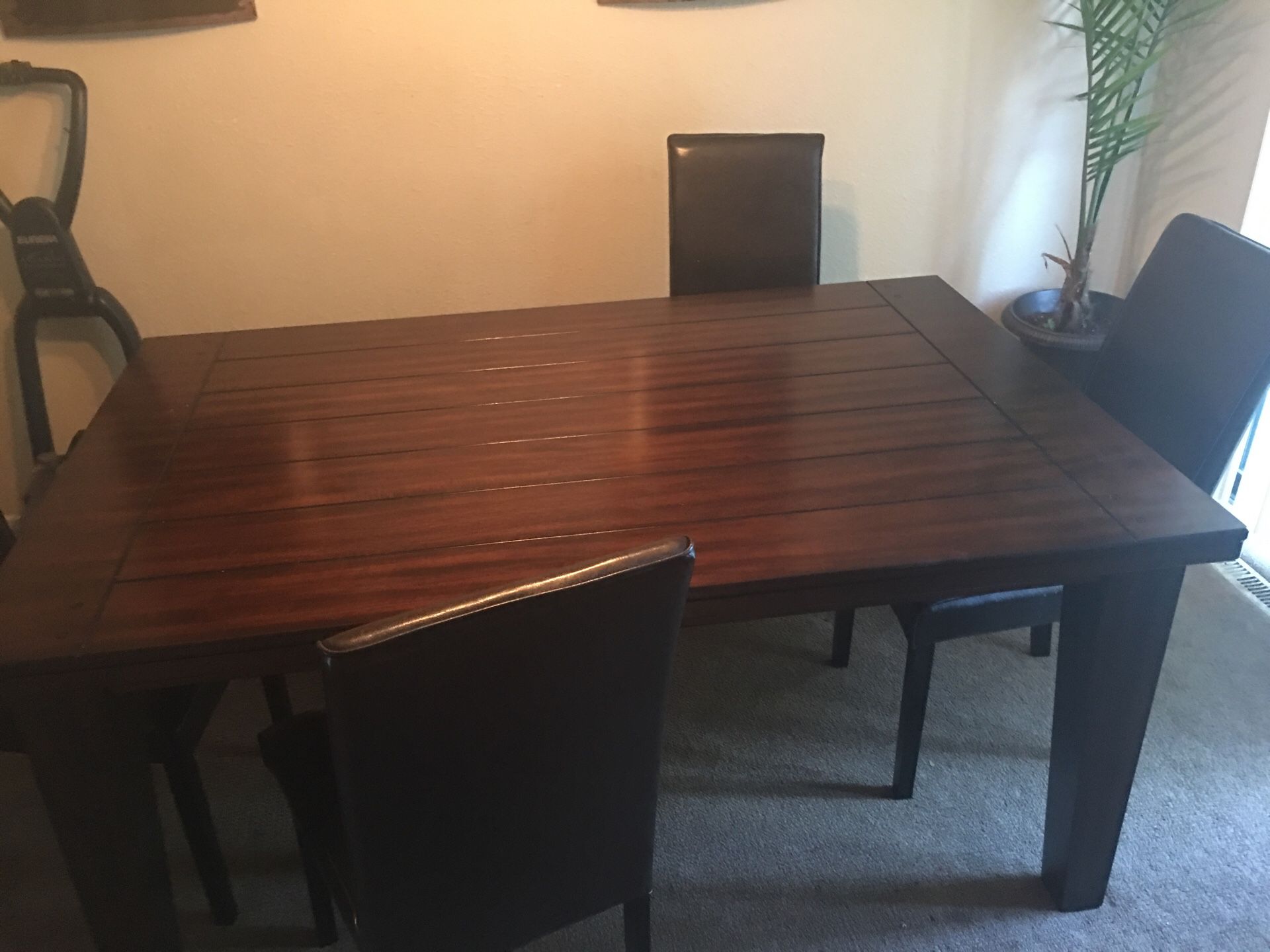 Wood dining table With four chairs