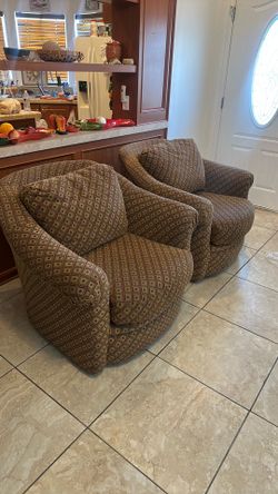 Two Swivel Chairs