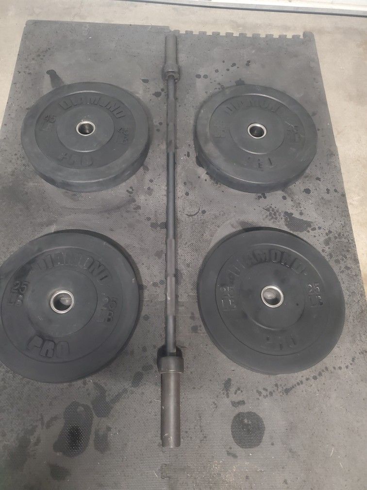 Olympic Weight Set. With Bar & Bumper Weights 180lbs All Together Read Description Below