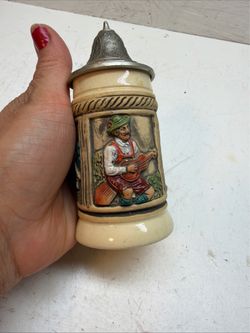 Vintage German Style Relief Beer Stein with Pewter Lid