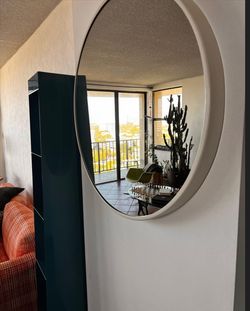 CB2 Round White Wall Mirror