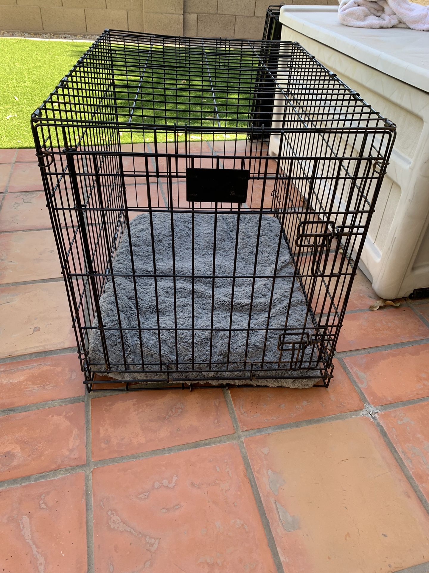 Intermediate Wire Dog Crate With A Dog Bed