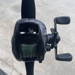 Daiwa Infinite Bait caster on 5’ Shakespeare Ugly Stik #7