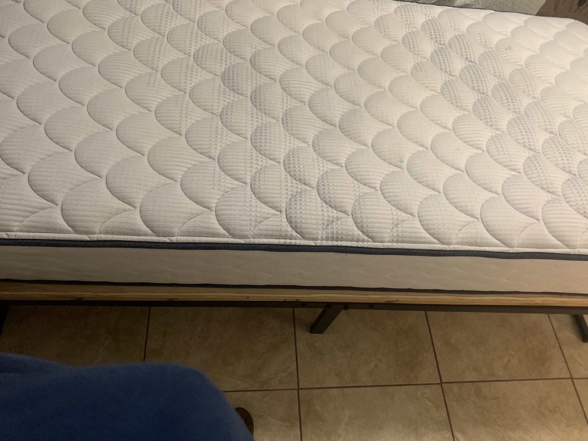 Twin bed with bed frame and mattress