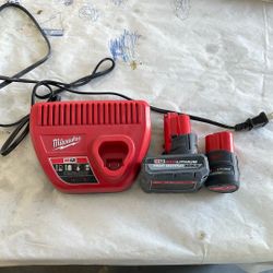 Milwaukee M12 Battery Charger And Batteries 