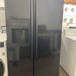 Black LG Side by Side Refrigerator and Freezer