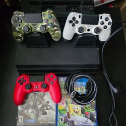 PS4 Console Bundle with 3 Controllers, charging dock and Games
