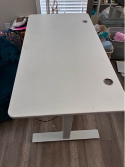 Adjustable height desk