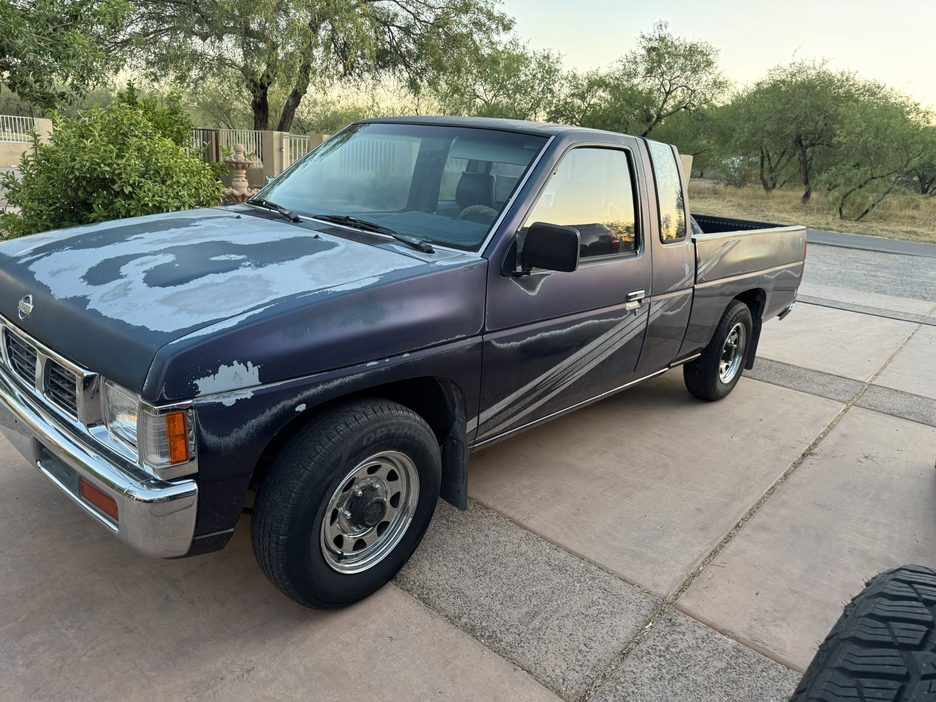 93. Nissan extended cab, pick up.