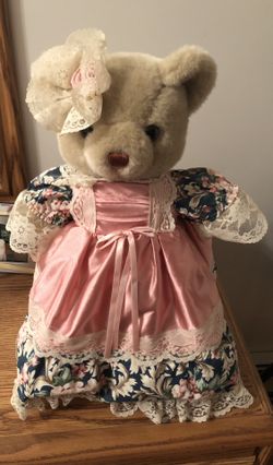 Decorative teddy bear on stand