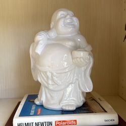 White Ceramic smiling Buddha