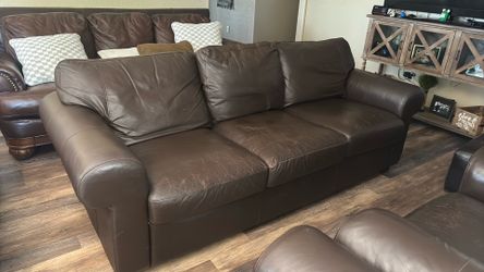 Three piece leather couches no rips ostain